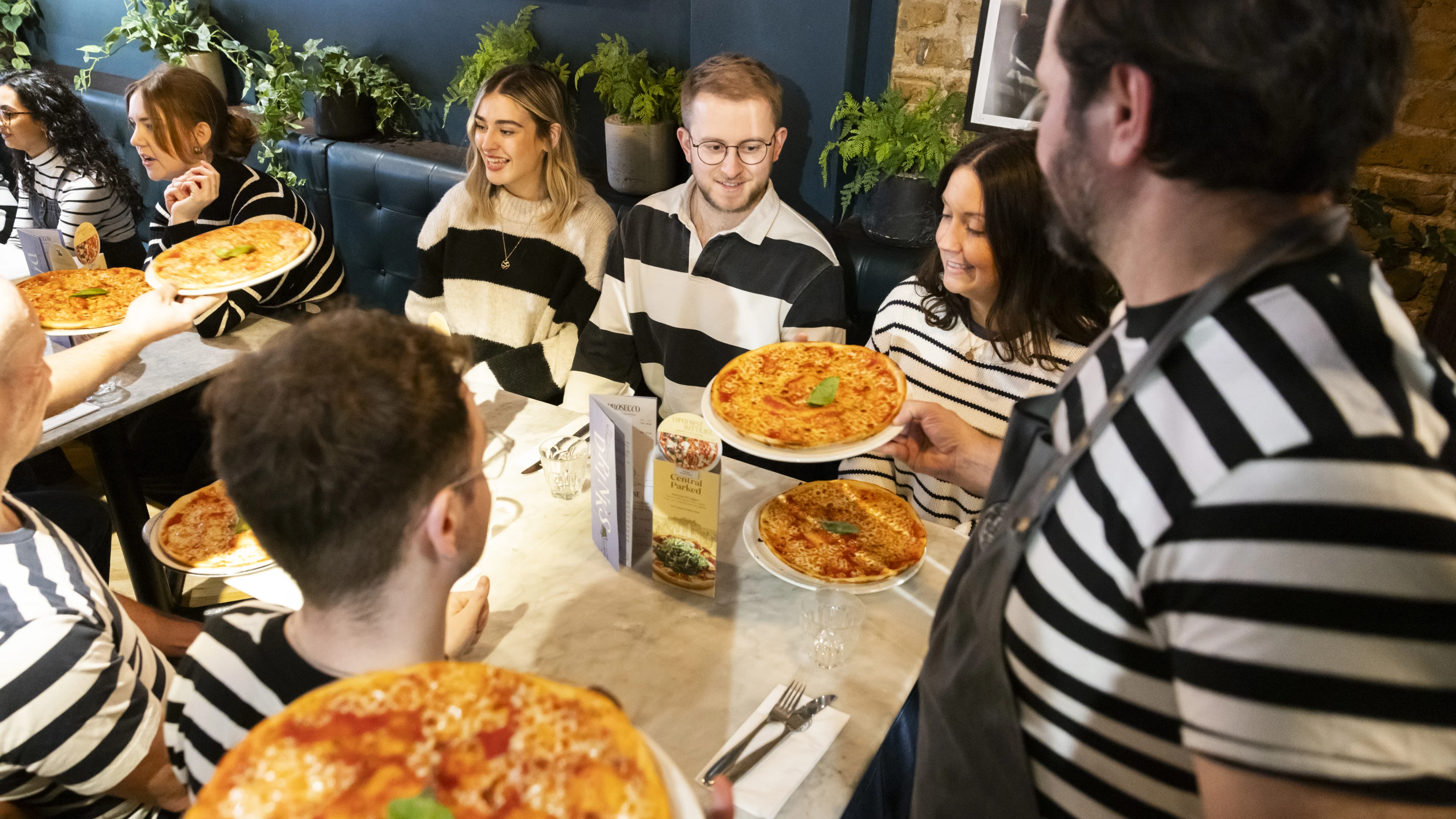 Earn Your Stripes Returns: Milano sparks free pizza frenzy, giving away 1,000 pizzas for National Pizza Day